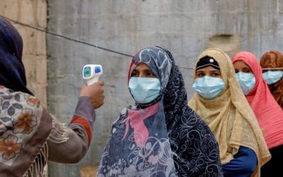 Female Polio Vaccinators receiving their Covid temperature