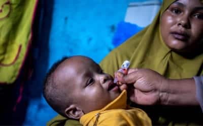 Child being vaccinated in Somalia immunization campaigns underway