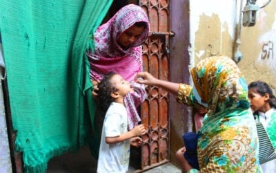A child is vaccinated in Sadder Town, Karachi, Pakistan
