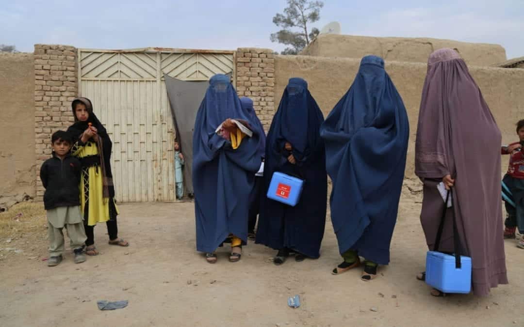 Female Vaccination Team immunize children in Afghanistan