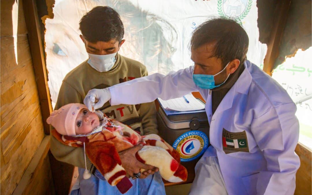A child is immunized in Pakistan with the help of the UAE