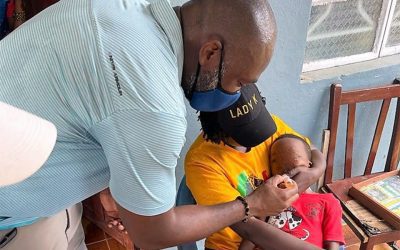 Dr. Victor Eboh administers vaccine in Sierra Leone